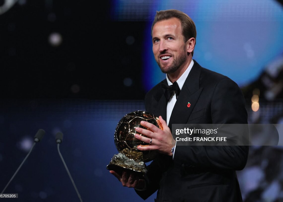 England and Bayern Munich forward Harry Kane smiles after receiving the Ballon d'Or award for the best male footballer during the 2026 Ballon d'Or (Photo by FRANCK FIFE / AFP via Getty Images)
