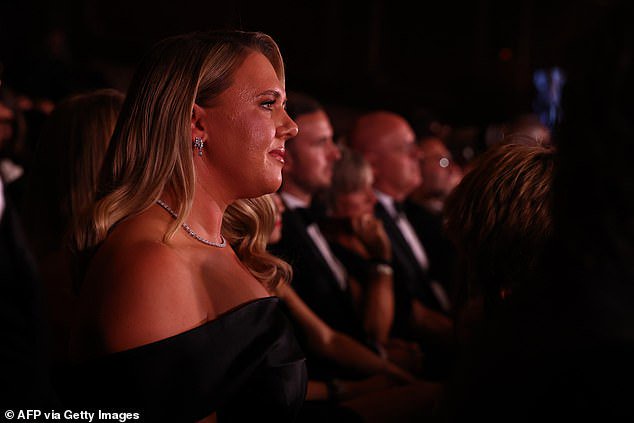 Katie watches on nervously before her husband bags the Ballon d'Or in London
