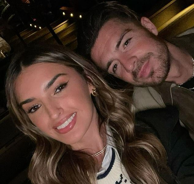 Grealish (pictured with partner Sasha Attwood) was absent after missing training prior to the game on Thursday - Instagram: sashaa__attwood