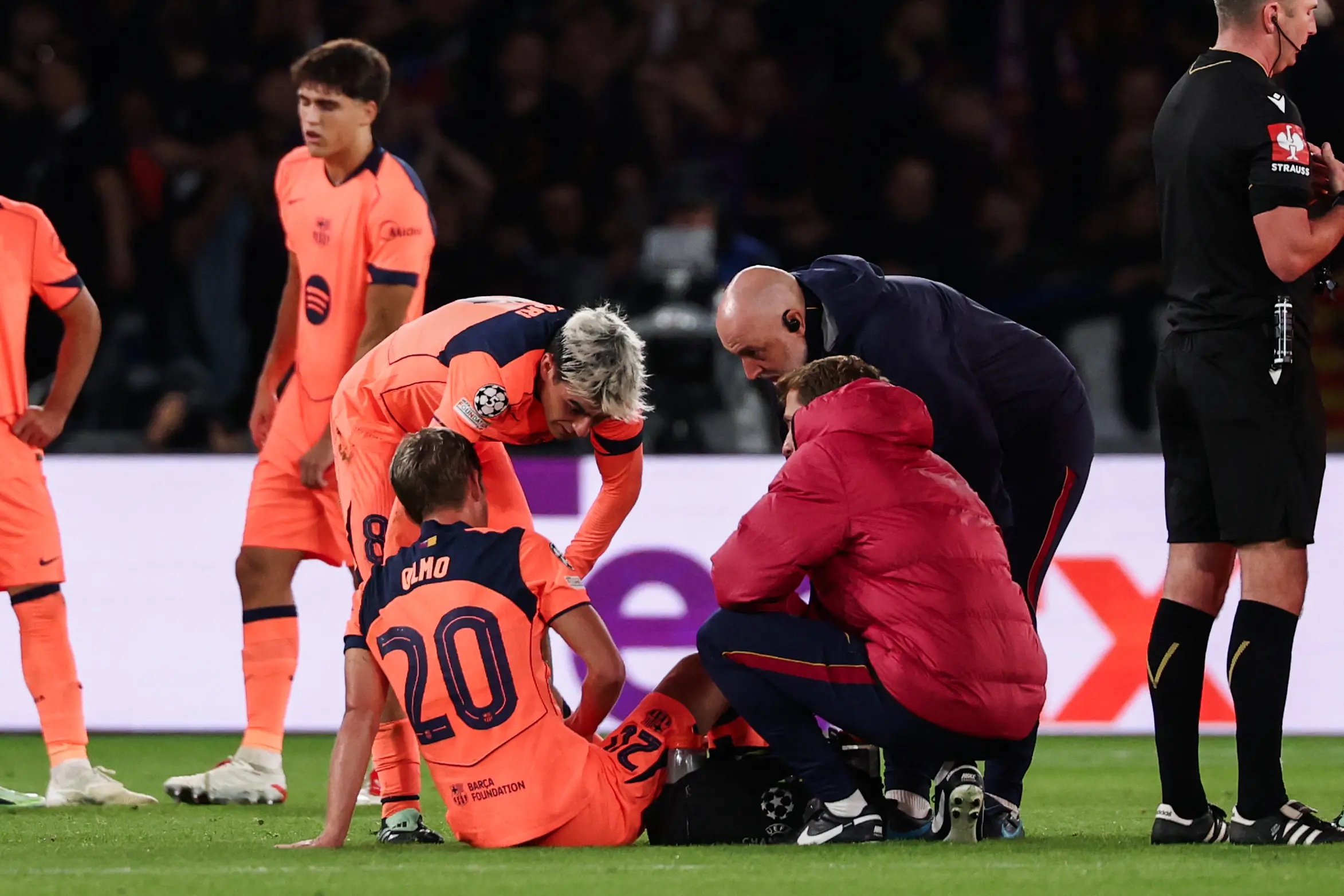 Dani Olmo getting medical treatment on the pitch.    