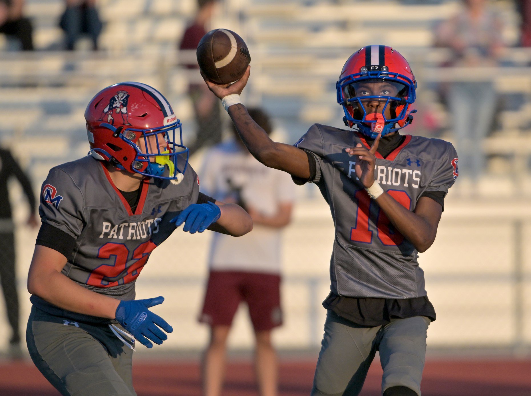Old Mill Patriots quarterback Edward Buck III #10 throws in the second quarter. The Old Mill Patriots host the visiting Broadneck Bruins in high school football at the Severn Run High School. (Paul W. Gillespie/Staff)