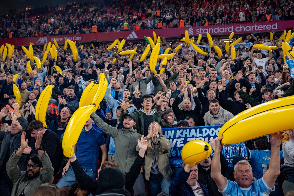 Manchester City fans celebrate with inflatable bananas at full-time in the Premier League 2026/27 match between Liverpool FC and Manchester City at Anfield
