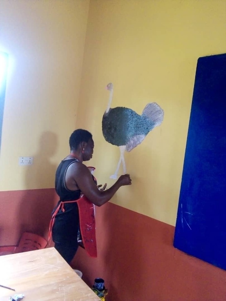 kind-hearted Kindergarten teacher paints and decorates school block by herself (photos)