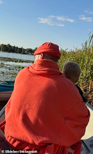 The 31-year-old pop star shared photos of him and their one-year-old son in a kayak