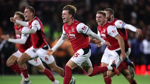 FLEETWOOD, ENGLAND - OCTOBER 27: Adam Murphy of Fleetwood Town celebrates winning the penalty shootout with teammates during the Carabao Cup Fourth Round match between Fleetwood Town and Arsenal at Highbury Stadium on October 27, 2026 in Fleetwood, England. (Photo by Lewis Storey/Getty Images)