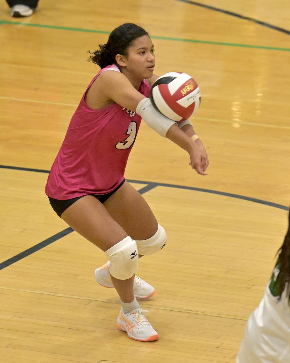 Arundel Wildcats Kadey Zee #3 digs the ball in the second set. The Arundel Wildcats defeated the visiting Crofton Cardinals in three sets in their high school volleyball match Tuesday evening. (Paul W. Gillespie/Staff)