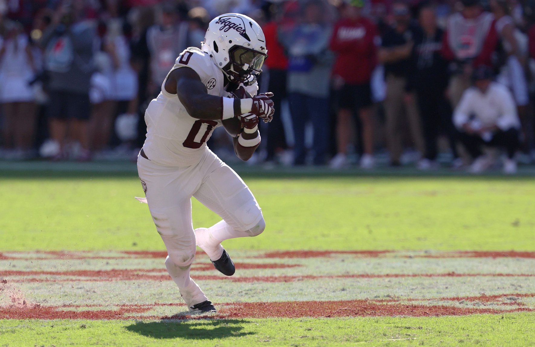 Oct 24, 2026; Tuscaloosa, Alabama, USA;  Texas A&amp;M Aggies running back KJ Edwards (0) runs the ball against the Alabama Crimson Tide during the first half at Saban Field at Bryant-Denny Stadium.  Mandatory Credit: David Leong-Imagn Images