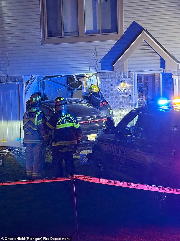 Emergency services: The car crashed into the Chesterfield Township, Michigan residence around 7pm on Sunday