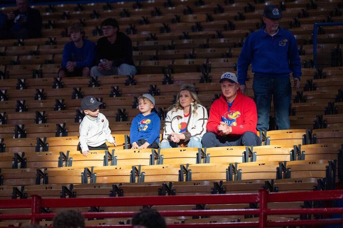 Fans sit in the sunlight inside Allen Fieldhouse before Late Night in the Phog, on Friday, October 16, 2026. In lieu of the traditional Late Night variety shown scrimmage, the Jayhawks will play an exhibition game vs. the Pittsburg State Gorillas.