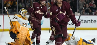 Logan Cooley has 1st NHL hat trick, Coyotes stop Predators’ points streak at 18 with 8-4 win