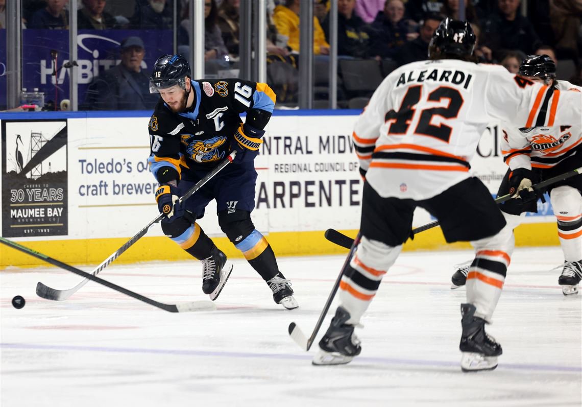 Toledo’s Brandon Hawkins handles the puck during the second game of the ECHL Kelly Cup Playoffs Central Division finals between the Toledo Walleye and Fort Wayne Komets at the Huntington Center in Toledo on May 12.