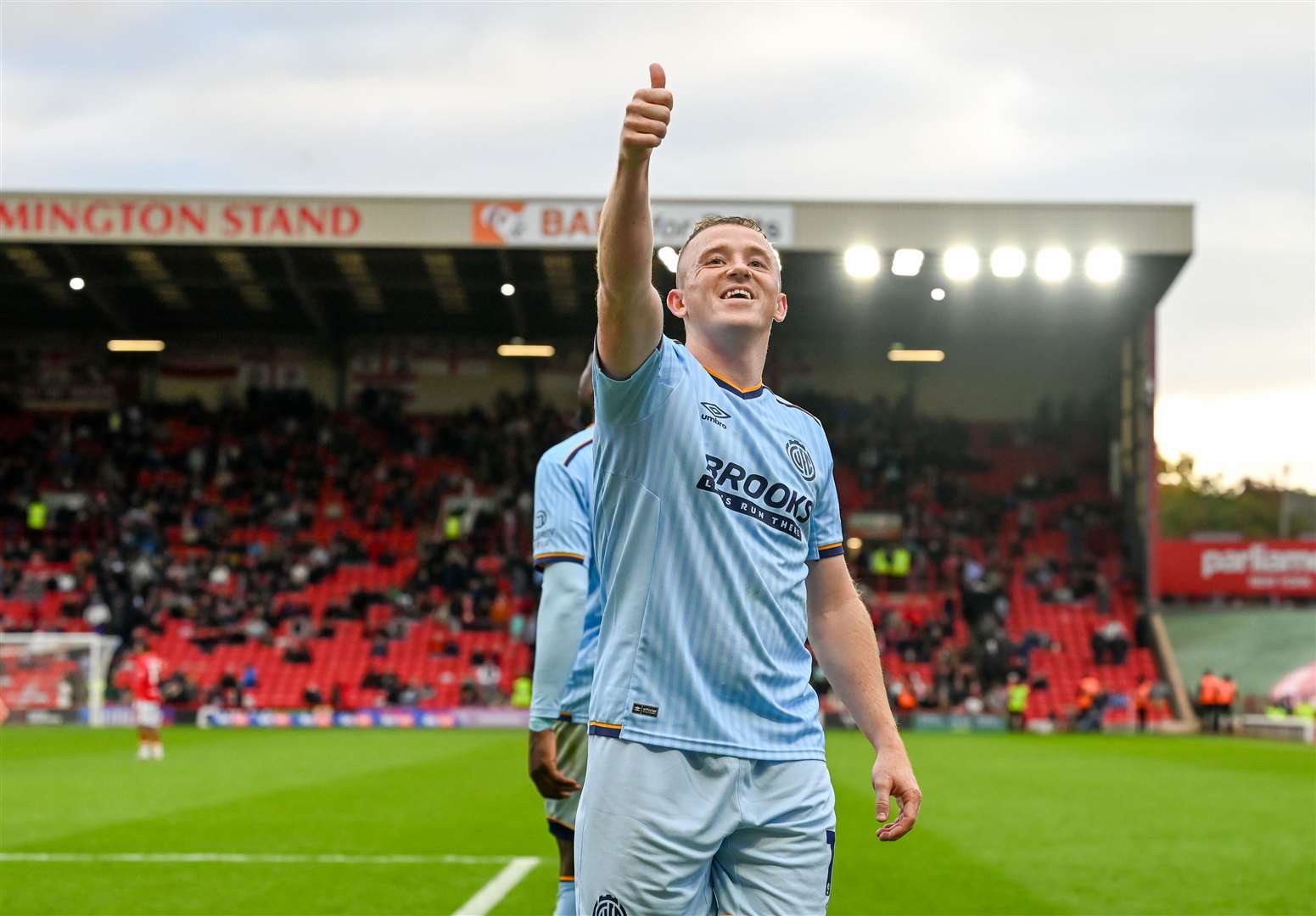 Shayne Lavery celebrates in front of the travelling Cambridge United fans away at Barnsley. Picture: Simon Lankester