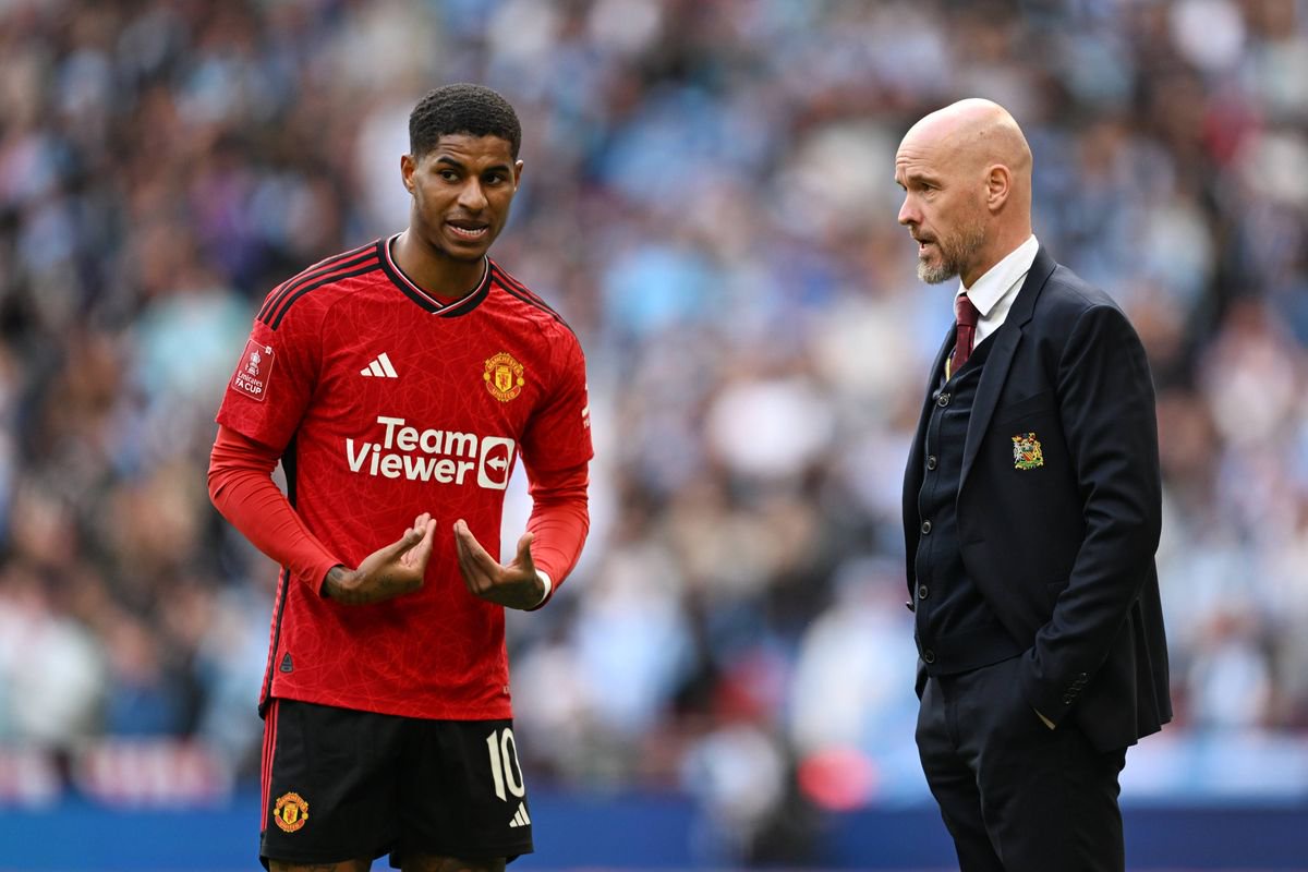 Manchester United winger Marcus Rashford in conversation with his former manager Erik ten Hag