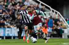 Lucas Paqueta of West Ham United is in action against Bruno Guimaraes of Newcastle United during the Premier League match at St. James's Park in Ne...