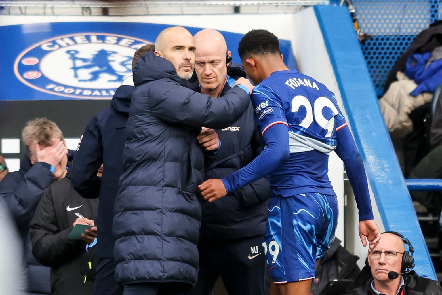 Head Coach Enzo Maresca with Wesley Fofana of Chelsea who goes off injured to be replaced during the Premier League match between Chelsea FC and As...