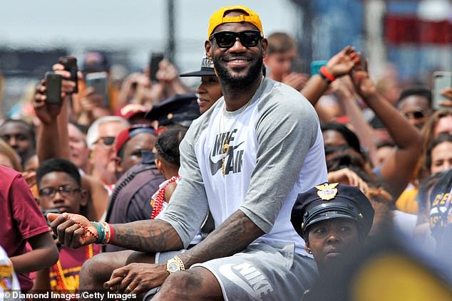 Ohio native LeBron James sits with Cleveland fans as he and the Cavs celebrate their 2016 title