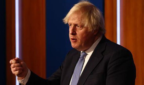 Boris Johnson speaking with the media