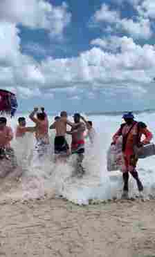 Beachgoers could be seen scrambling for safety