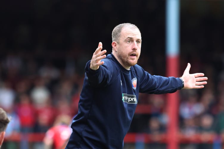 Aldershot Town manager Scott Davies shows his frustration during their 3-1 defeat against Carlisle United (Photo: Ian Morsman)