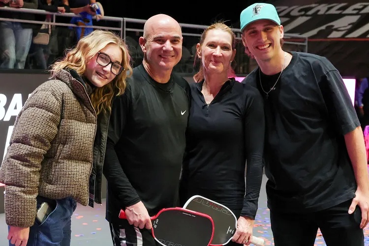 Jaz Agassi, Andre Agassi, Steffi Graf and Jaden Agassi pose on the court after Andre Agassi and Graf won the Pickleball Slam 3 championship at Michelob ULTRA Arena on February 16, 2025 in Las Vegas, Nevada.