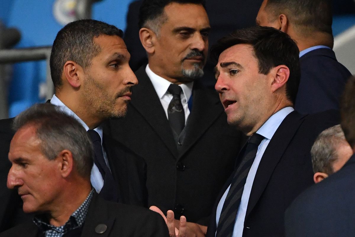 Manchester City Emirati chairman Khaldoon al-Mubarak (L) talks with Greater Manchester Mayor Andy Burnham the Vincent Kompany testimonial football match between the Manchester City Legends and the Premier League All-stars XI at the Etihad Stadium in Manchester, northwest England, on September 11, 2019. (Photo by Paul ELLIS/AFP) (Photo credit should read PAUL ELLIS/AFP via Getty Images)