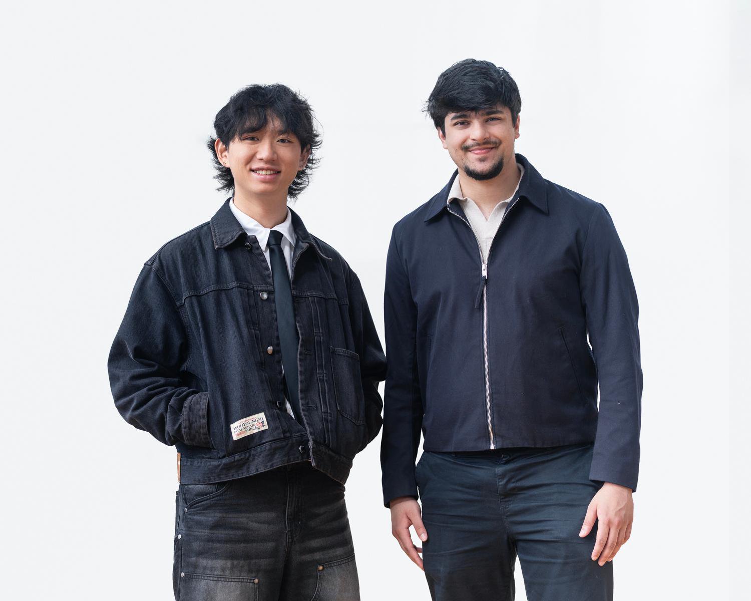 Kelvin Cui and another man standing side by side against a white background.