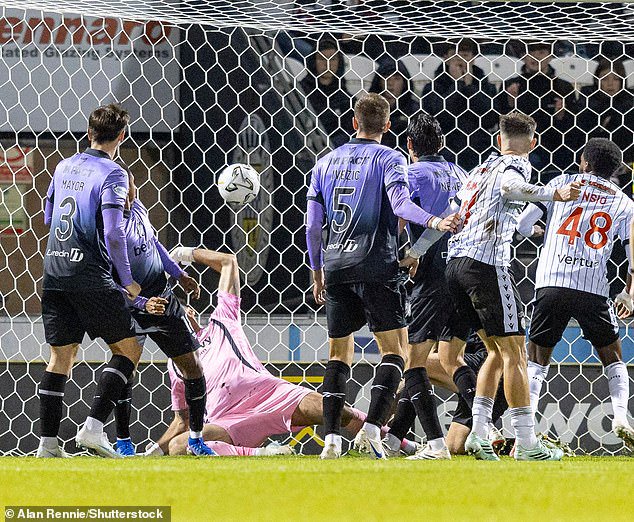 The unfortunate Kerr diverts the ball in as St Mirren snatch a point in the dying moments