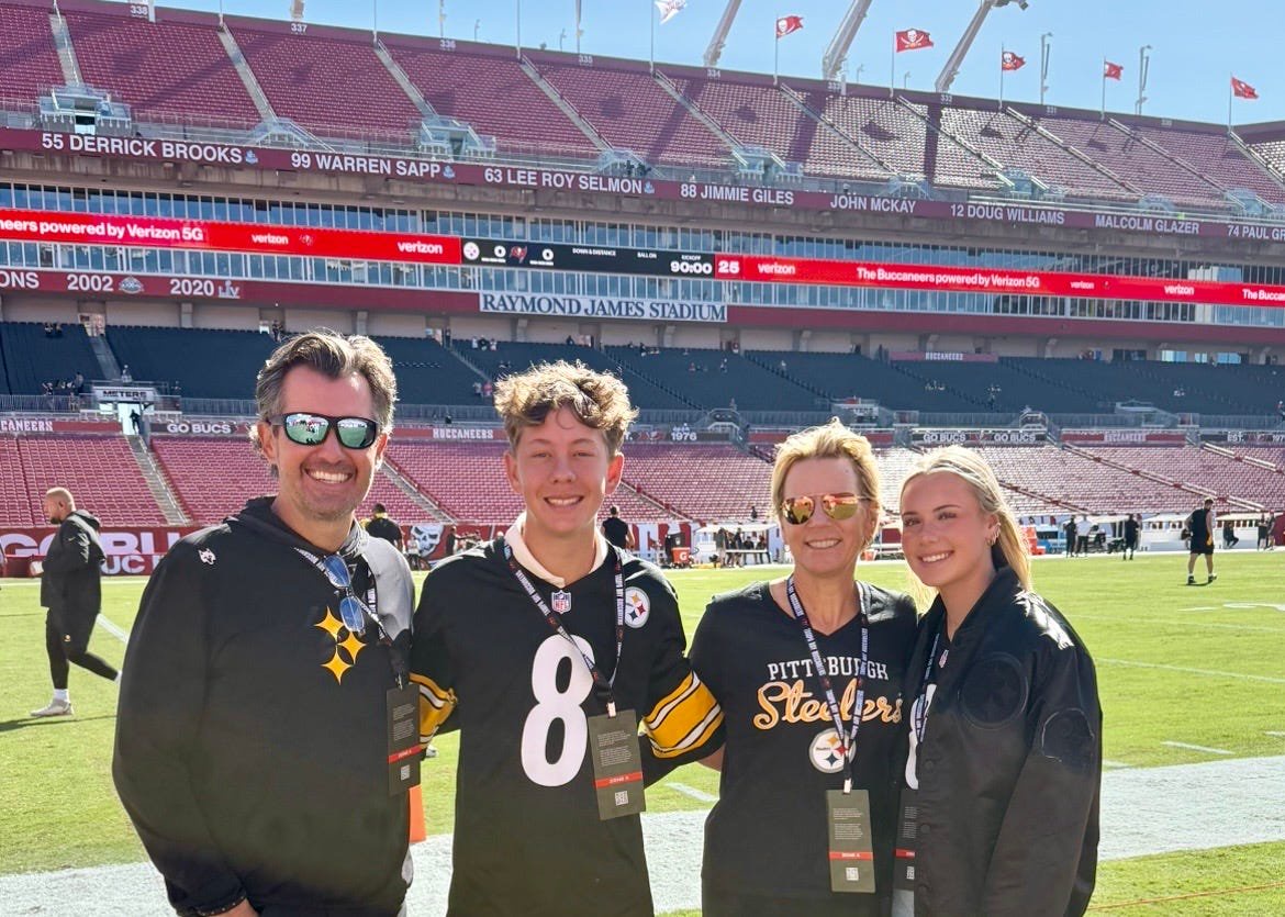 LPGA legend Annika Sorenstam takes in her first Tampa Bay Buccaneers game with husband Mike McGee and kids Will and Ava. 