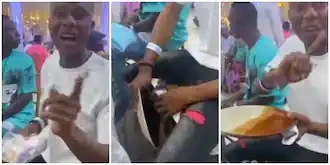Angry Nigerian man refuses to spray his money, steals plate and spoon after not being served food at even