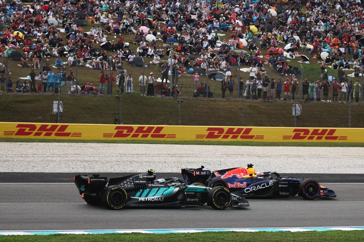 Andrea Kimi Antonelli and Max Verstappen on track during the 2026 F1 Bahrain Grand Prix in Malaysia