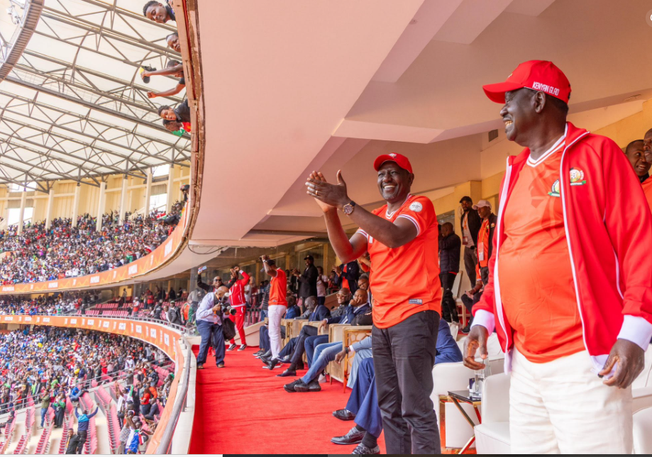 President William Samoei Ruto and the late former Prime Minister Raila Odinga at Kasarani Stadium cheering Harambee Stars in their opening CHAN 2024 match against DR Congo on August 3, 2025. PHOTO/https://www.facebook.com/drrayomollo