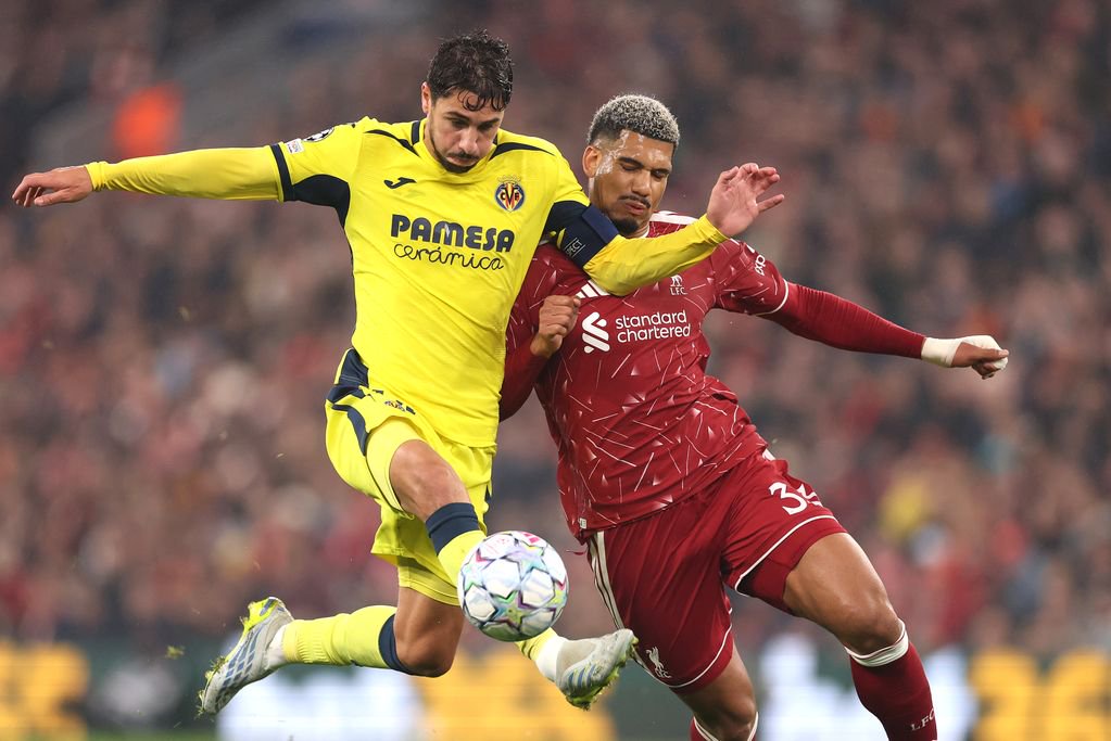 Santi Comesana of Villarreal is challenged by Ronald Araujo of Liverpool.