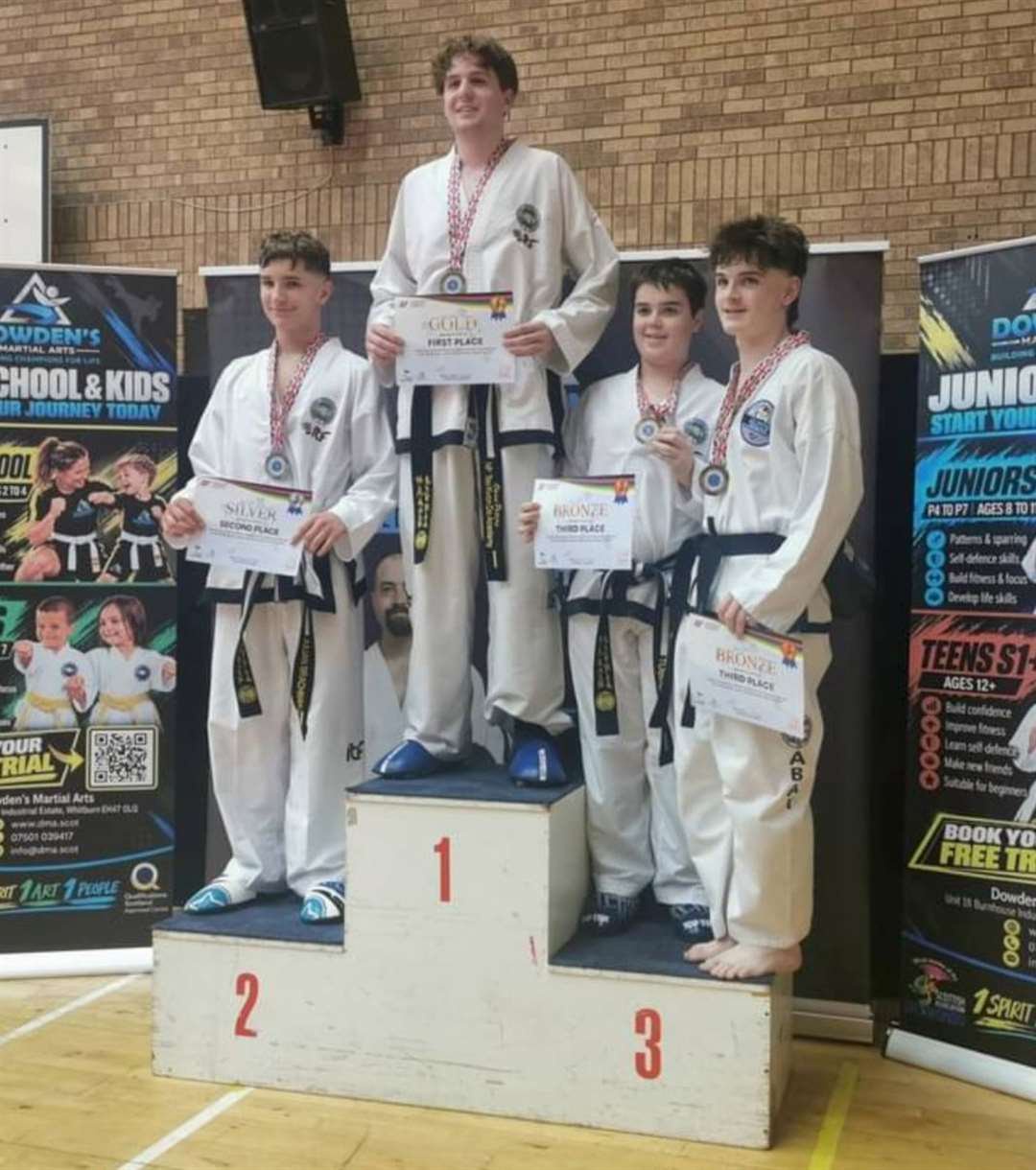 Oscar Crawford won a bronze medal for sparring in his weight division at the DMA taekwondo competition in Wishaw in October 2026.