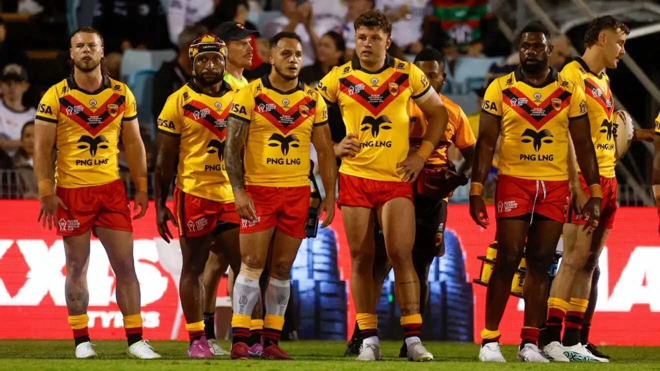 Papua New Guinea appear dejected after conceding a try against England during the 2026 Rugby League World Cup
