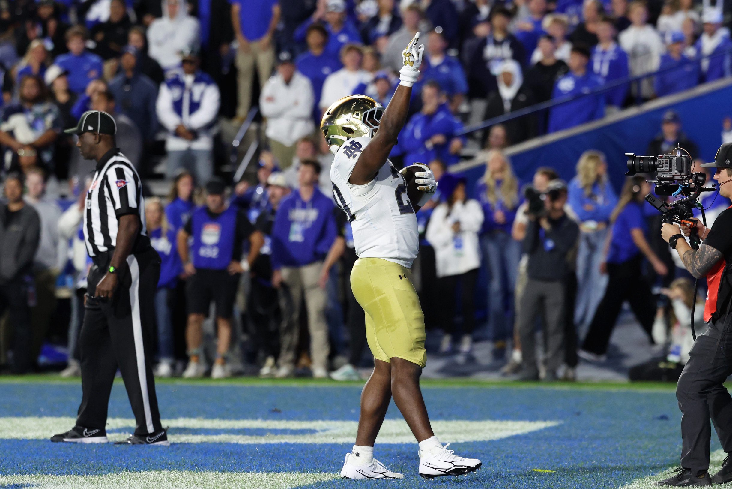 Oct 17, 2026; Provo, Utah, USA;  Notre Dame Fighting Irish running back Jonaz Walton (20) celebrates after scoring a two-point conversion against the Brigham Young Cougars during the second half at LaVell Edwards Stadium.  Mandatory Credit: Rob Gray-Imagn Images