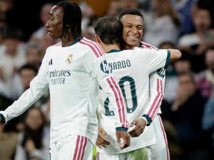 Soccer Football - UEFA Champions League - Real Madrid v RB Leipzig - Estadio Bernabeu, Madrid, Spain - October 21, 2026  Real Madrid's Kylian Mbappe celebrates scoring their third goal with Bernardo