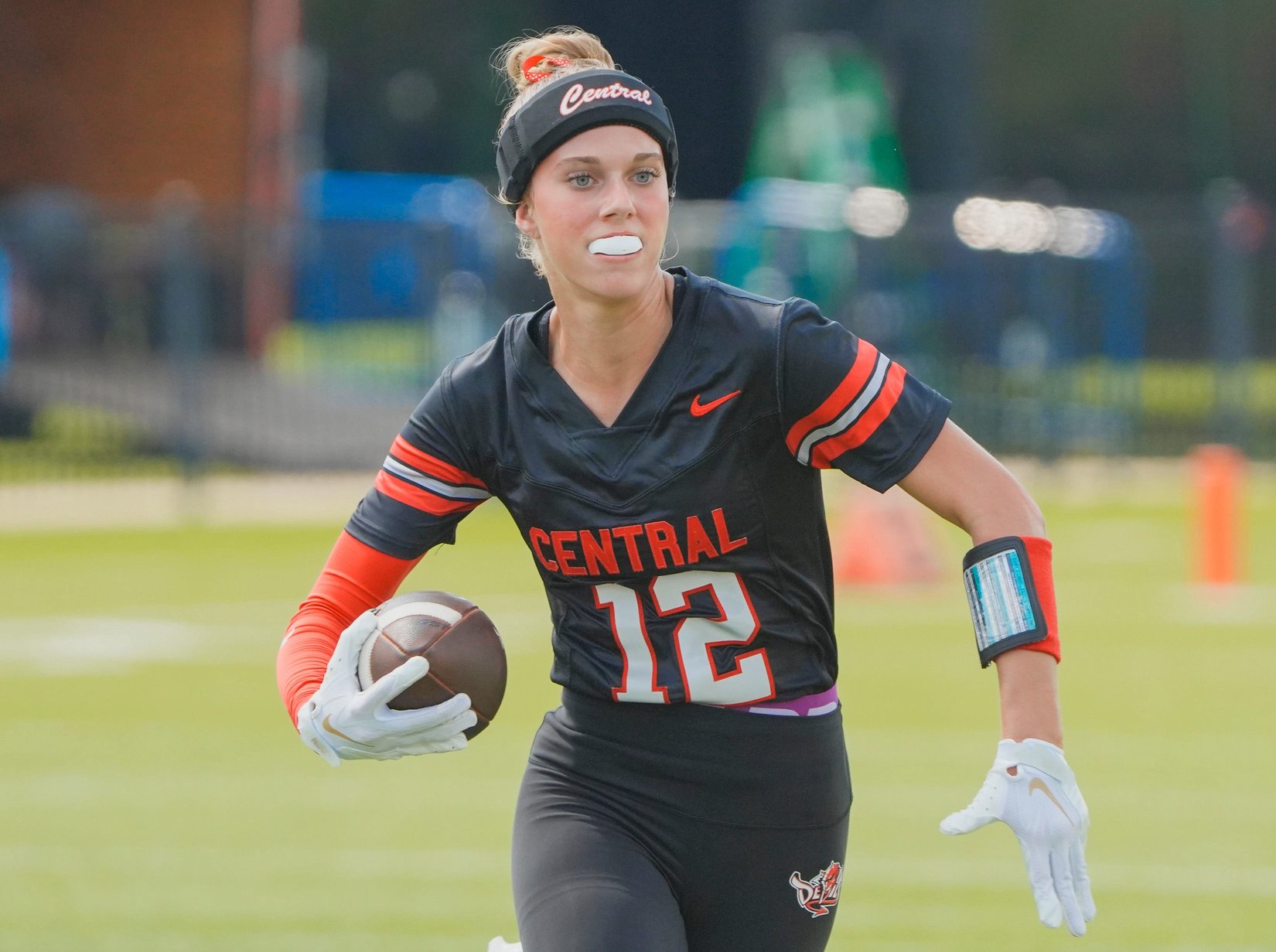 Central-Phenix City's Savannah Sevier (12) carries the ball against Montgomery Catholic during the AHSAA Girls Flag Football Kickoff Classic Game in Phenix City, Ala., on Thursday August 20, 2026.