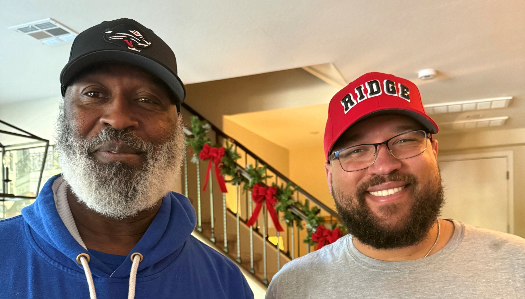 Lovie Smith (left) and his son Miles will lead Mesa Desert Ridge's football program. They have NFL success.