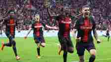 Bayer Leverkusen players celebrate their late equaliser against Stuttgart