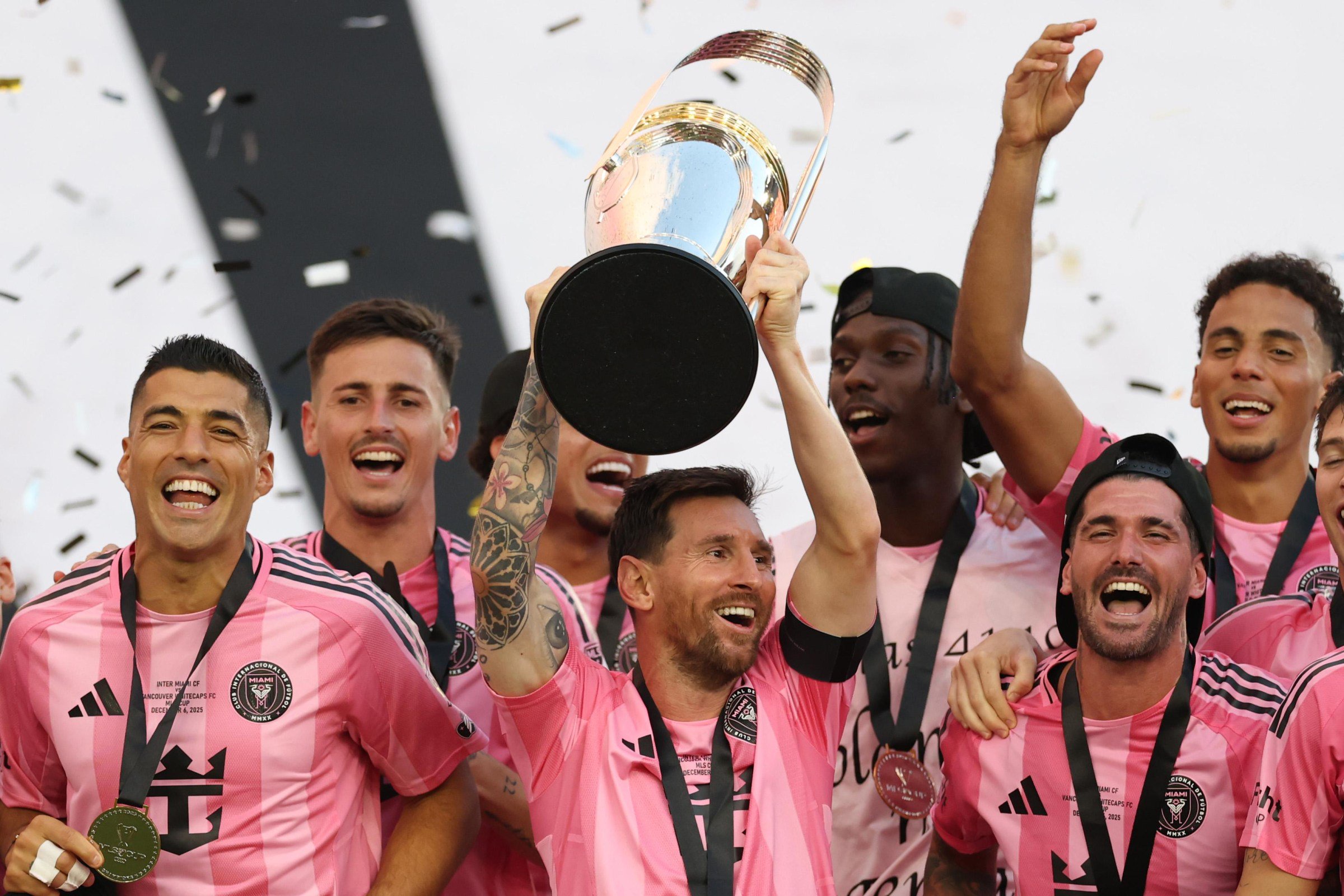 FORT LAUDERDALE, FLORIDA - DECEMBER 06: Lionel Messi #10 of Inter Miami CF lifts the Champion’s trophy after winning the Audi 2025 MLS Cup Final match between Inter Miami CF and Vancouver Whitecaps FC at Chase Stadium on December 06, 2025 in Fort Lauderdale, Florida. (Photo by Maddie Meyer/Getty Images)