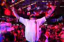 An England fan celebrates at Boxpark during England's opening Euro 2024 game v Serbia