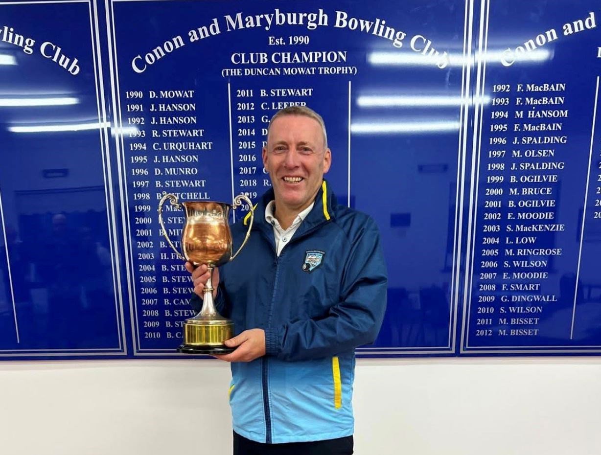 Barry Wilson with the bowling trophy he won just three years after picking up the sport. Picture: submitted