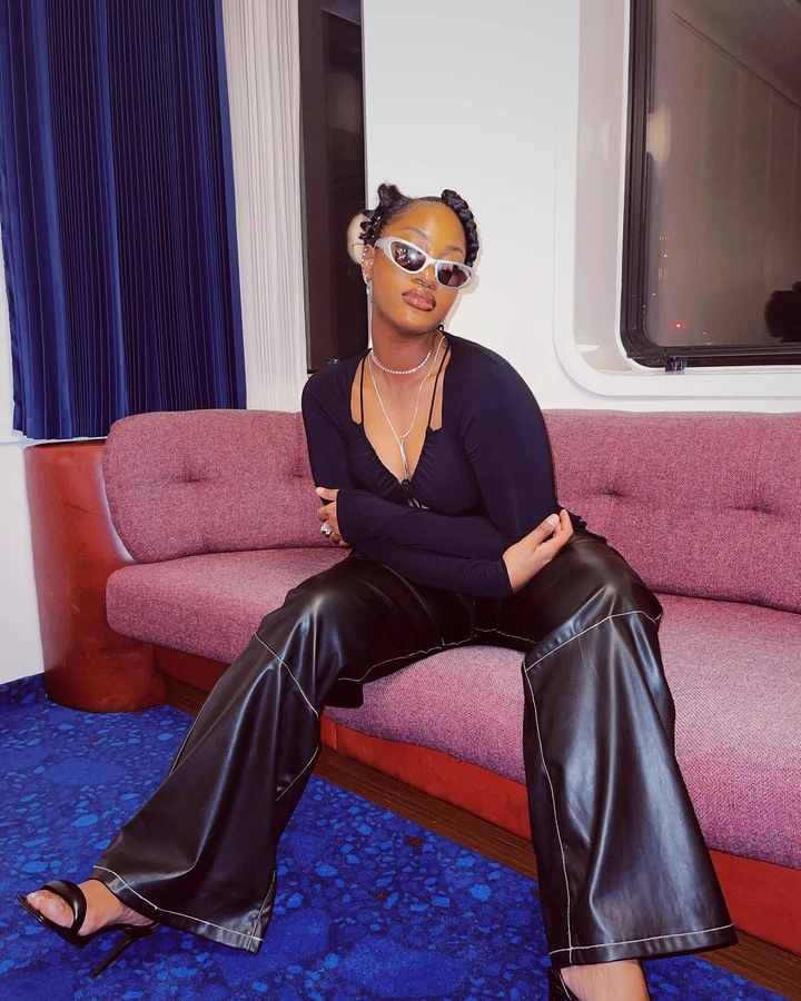 wizkid - Tems shares 4 lovely pictures of herself relaxed on a couch  2064b5c176f3465c82235218a7e12aab?quality=uhq&format=webp&resize=720