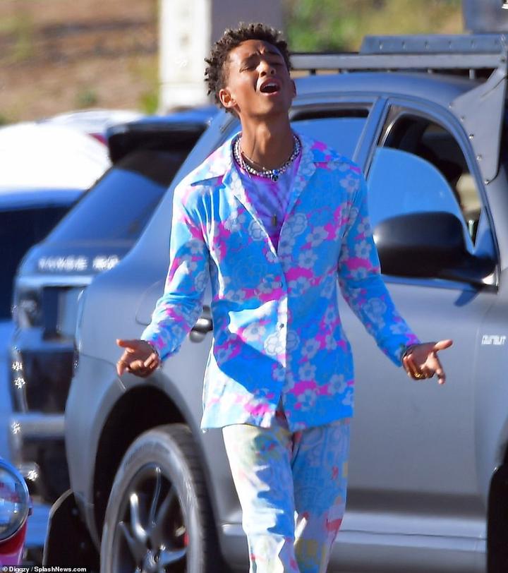 Bright: Jaden wowed onlookers in a technicolor suit jacket of a blue and pink color that featured a floral design