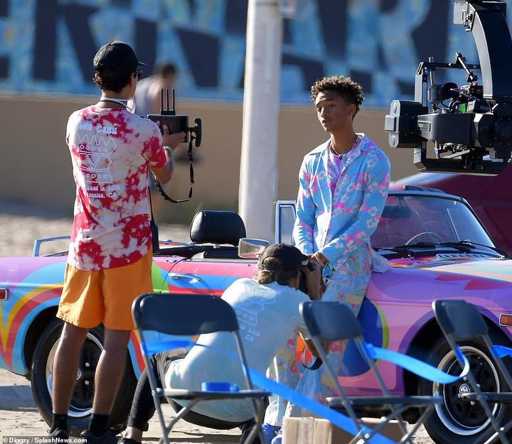 In charge: Passerbyers also noted that the 22-year-old directed the entire shoot himself and continued to tell crew members how to arrange the camera