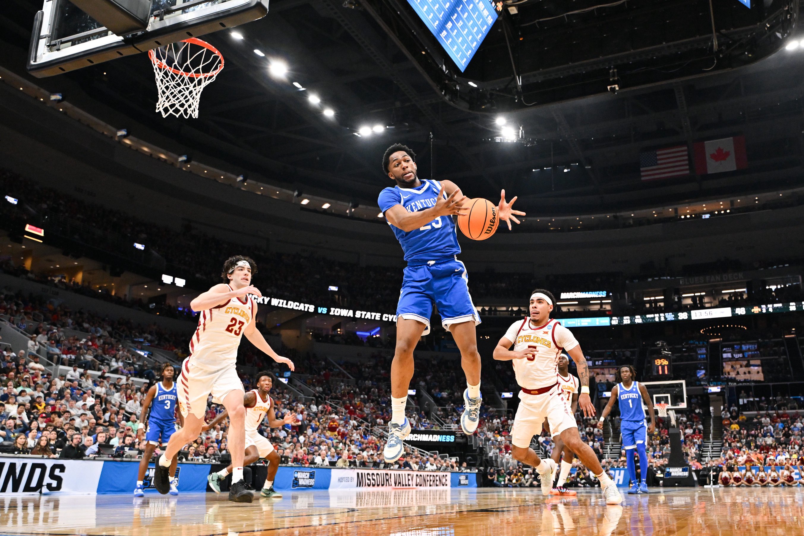 Mar 22, 2026; St. Louis, MO, USA; Kentucky Wildcats forward Mouhamed Dioubate (23) chases a loose ball during the second half against the Iowa State Cyclones during a second round game of the men's 2026 NCAA Tournament at Enterprise Center. Mandatory Credit: Jeff Curry-Imagn Images