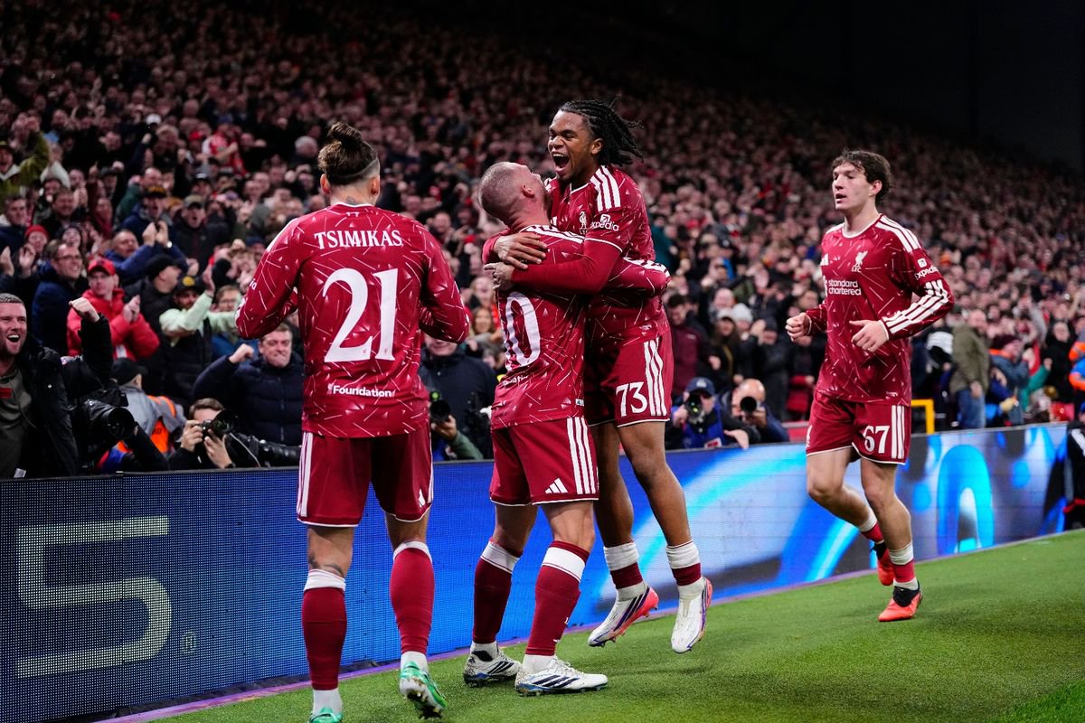 Alexis Mac Allister central midfield of Liverpool and Argentina celebrates with Rio Ngumoha left winger of Liverpool and England after scoring his sides first goal during the UEFA Champions League 2026/27 League Phase MD3 match between Liverpool FC and Villarreal CF at Anfield on October 20, 2026 in Liverpool, United Kingdom