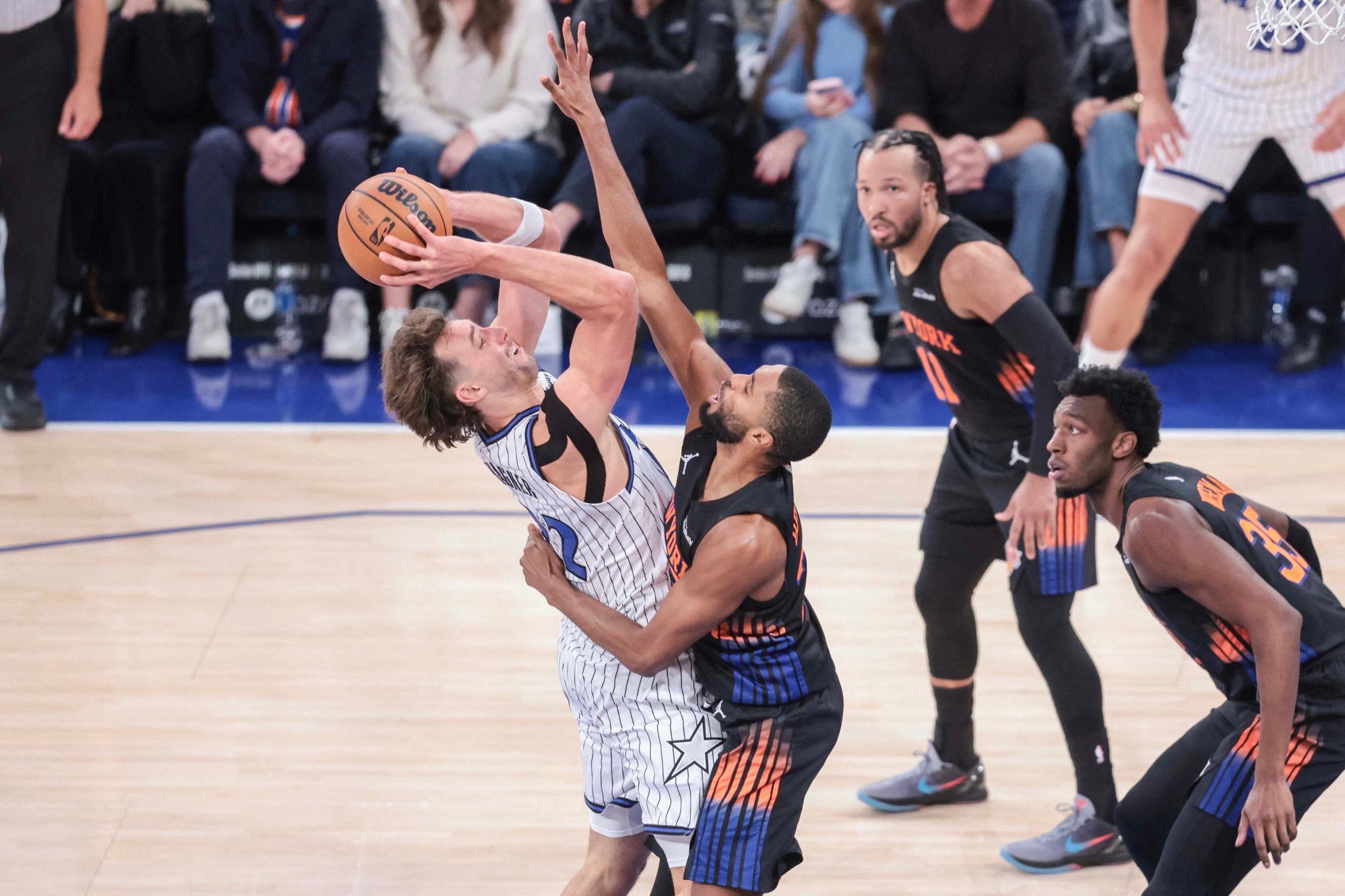 Oct 25, 2026; New York, New York, USA;  Orlando Magic forward Franz Wagner (22) looks to drive past New York Knicks guard Mikal Bridges (25) in the fourth quarter at Madison Square Garden. Mandatory Credit: Wendell Cruz-Imagn Images