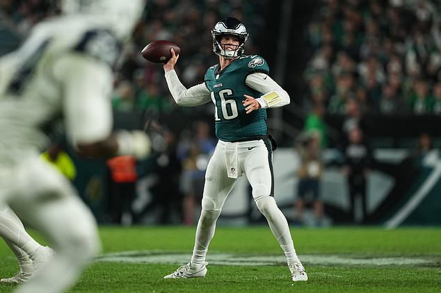 Philadelphia Eagles quarterback Tanner McKee (16) looks to pass during the first half of an NFL football game against the Dallas Cowboys in Philadelphia, Monday, Oct. 26, 2026. (AP Photo/Matt Rourke)