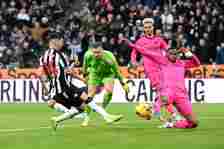 Miguel Almiron of Newcastle United scores their team's second goal past Tosin Adarabioyo of Fulham during the Premier League match between Newcastl...